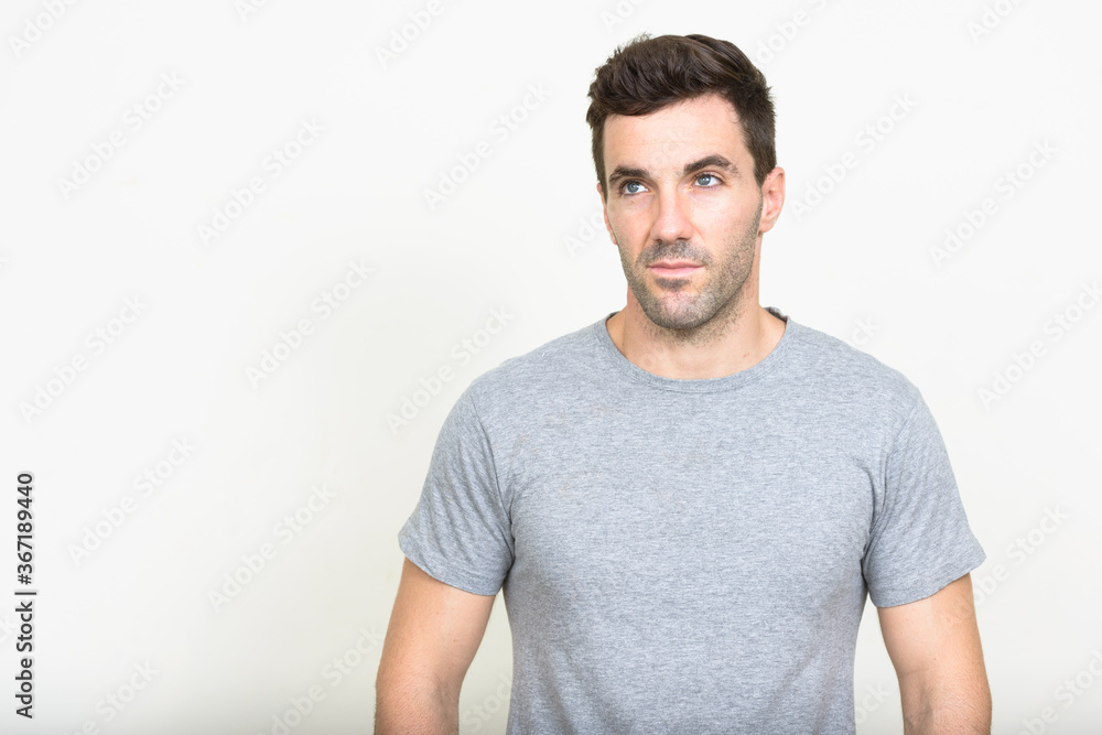 Portrait of handsome Hispanic man with beard stubble Portrait of handsome Hispanic man with beard stubble