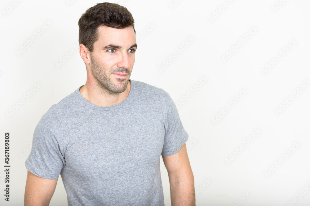 Portrait of handsome Hispanic man with beard stubble Portrait of handsome Hispanic man with beard stubble