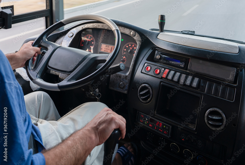 Bus's dashboard with the driver.