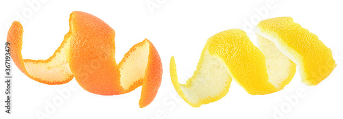 Fresh peel of lemon and orange fruit isolated on a white background. Citrus zest spiral.