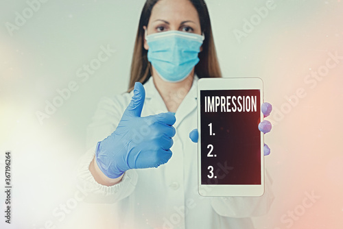 Conceptual hand writing showing Impression. Concept meaning opinion about something especially form without conscious thought Laboratory technician featuring paper accessories smartphone photo