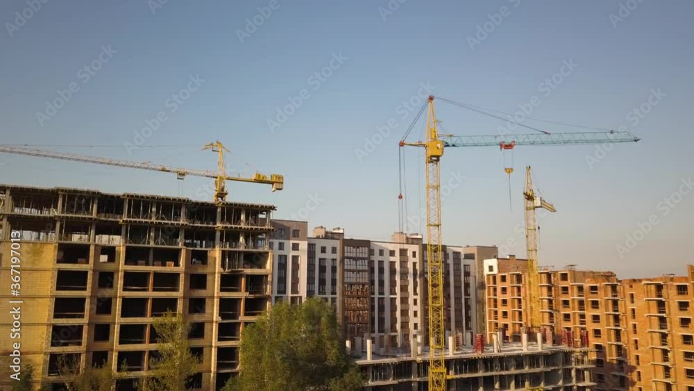 Aerial view of tall residential apartment buildings under construction. Aerial view of tall residential apartment buildings under construction.