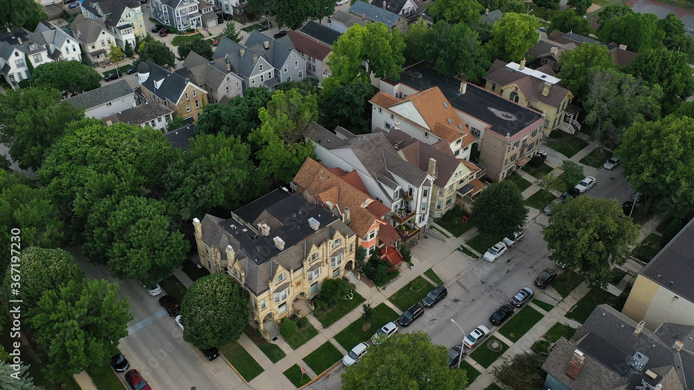 Aerial view of american neighborhood, houses nearby downtown Milwaukee, Wisconsin. Cloudy morning, summertime.