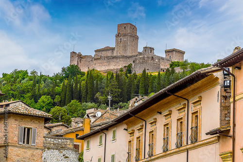 A view from Assisi, Umbria towards the Castle Rocca Maggiore on the summit of Mount Subasio in the summertime photo