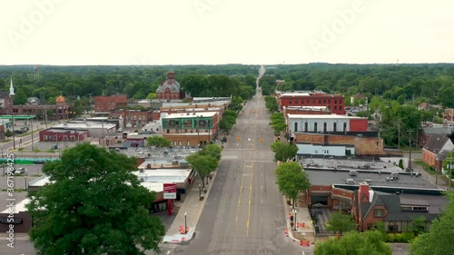 Scenic aerial flyover of a small town America on a quiet morning with empty streets 03