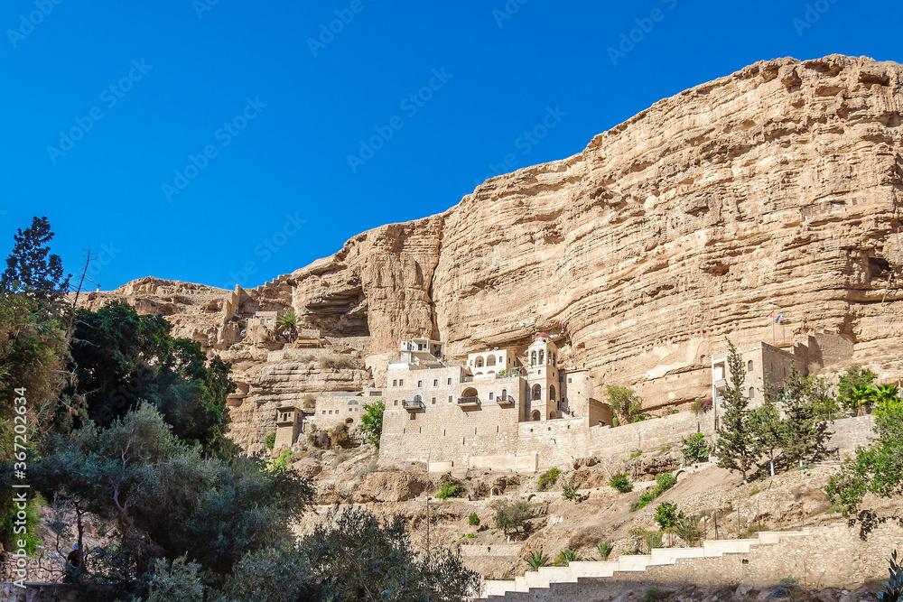 Orthodox Monastery of St. George Hosevit (Mar Jaris) in the Wadi Kelt Gorge. Judean desert near Jericho. Palestine, Israel.