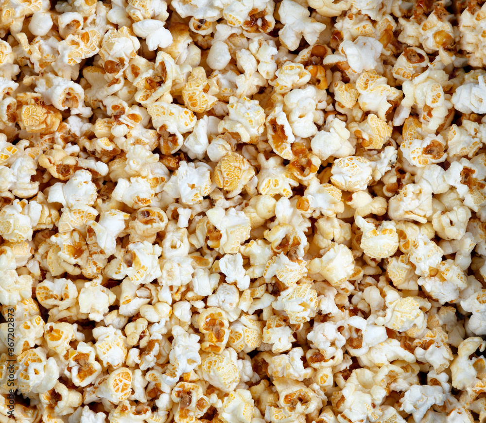Popcorn coated with caramel in filled frame format ready to eat Popcorn coated with caramel in filled frame format ready to eat