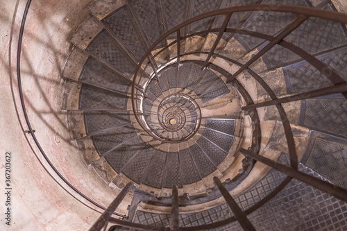 Paris, France - 07 24 2020: Spiral staircase inside The Triumphal arch