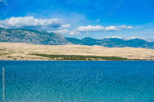 Island of Pag on Adriatic sea in Croatia Velebit mountain in background