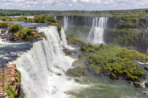 Forest, waterfalls and river with rocks