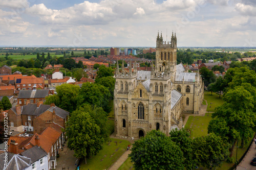Selby Abbey North Yorkshire England. Drone photograph of the Abbey looking at the south and east side in sun with Selby town behind. 