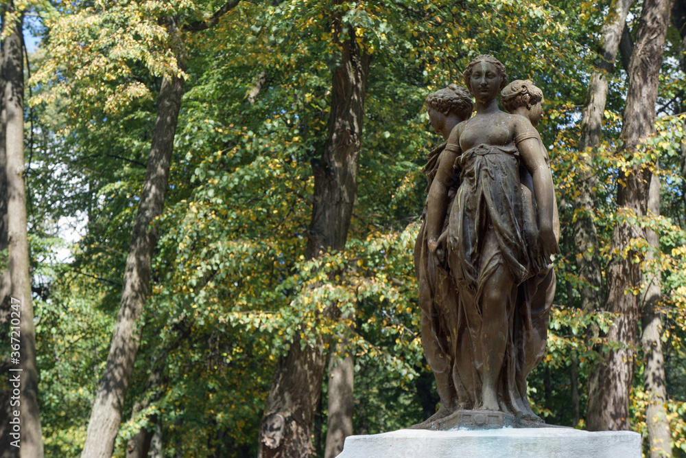 City Park. Ancient sculpture of three women - three graces. City Park. Ancient sculpture of three women - three graces.