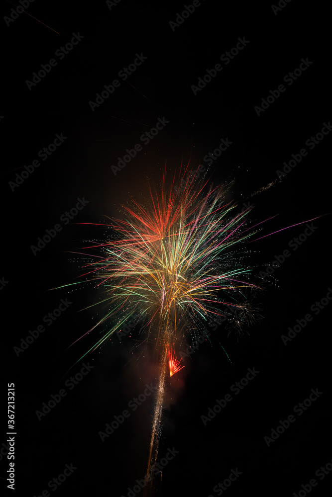 4th of July and new year Fireworks in the night sky. Firework concept background.