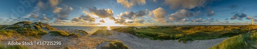 Fotografie, Obraz Panoramic view of Lyngvig lighthouse on wide dune of Holmsland Klit with beach v
