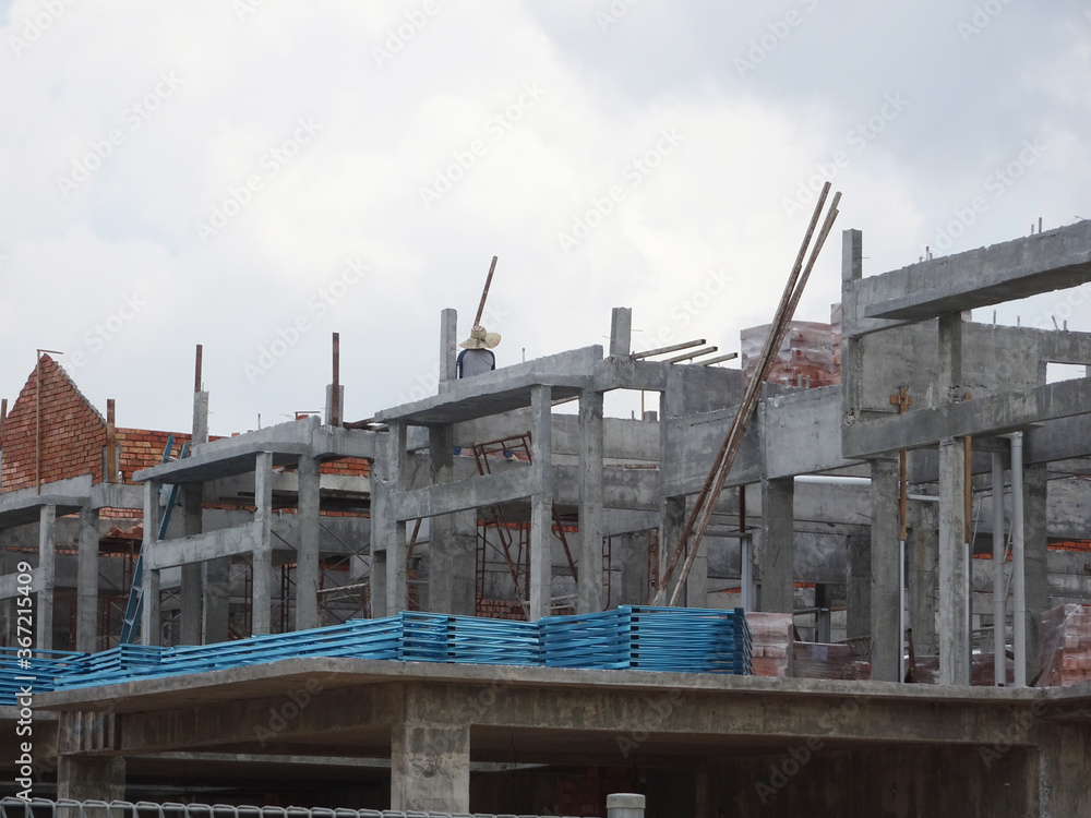 SEREMBAN, MALAYSIA -APRIL 07, 2020: New double story luxury terrace house under construction in Malaysia. Designed by an architect with a modern and contemporary style. SEREMBAN, MALAYSIA -APRIL 07, 2020: New double story luxury terrace house under construction in Malaysia. Designed by an architect with a modern and contemporary style.