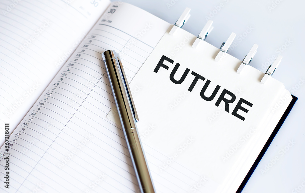 text FUTURE on the short note texture background with pen text FUTURE on the short note texture background with pen