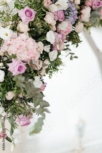 Close up flowers on the white background with the place for your text. Wedding decoration. Floral background