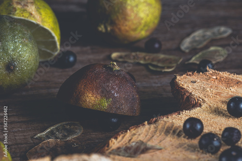 Still Life with Rotten Fruits, rotten lemon with rustic board