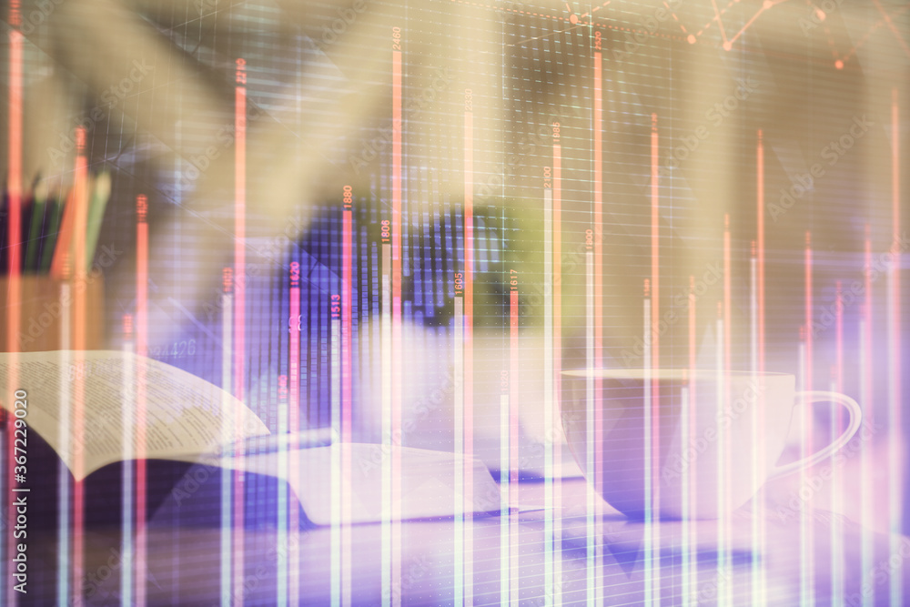Multi exposure of forex graph drawing and desktop with coffee and items on table background. Concept of financial market trading Multi exposure of forex graph drawing and desktop with coffee and items on table background. Concept of financial market trading