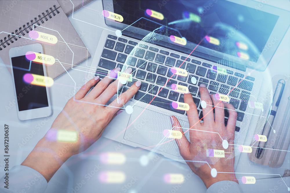 Double exposure of woman hands working on computer and world map hologram drawing. Top View. International business concept. Double exposure of woman hands working on computer and world map hologram drawing. Top View. International business concept.