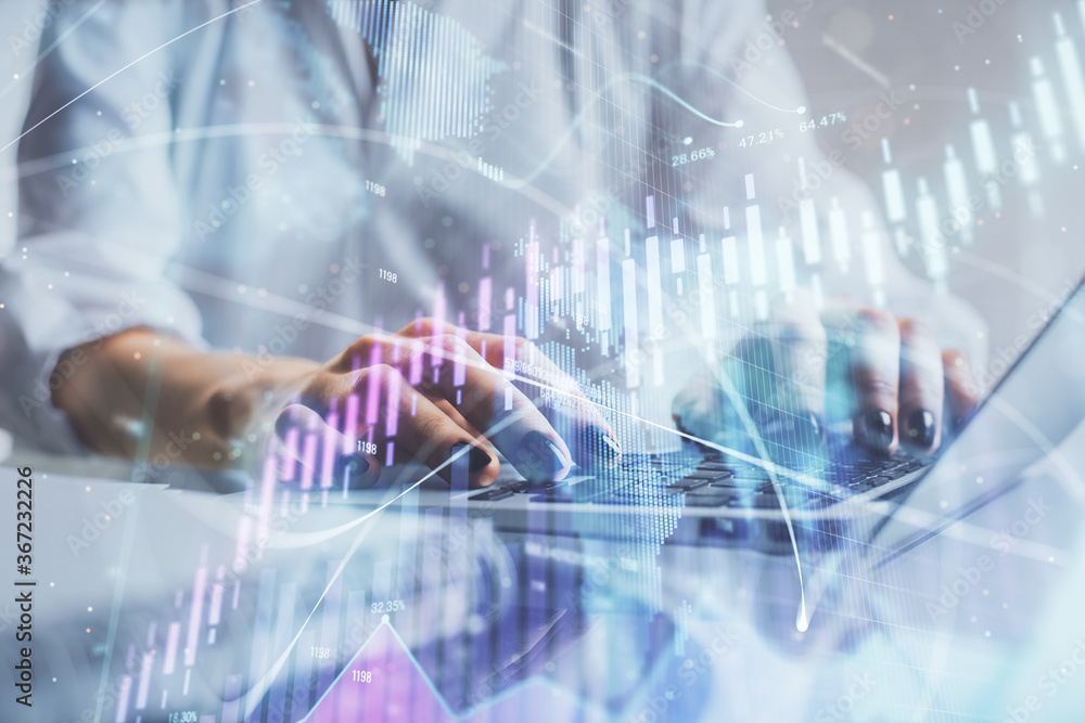 Double exposure of woman hands typing on computer and forex chart hologram drawing. Stock market invest concept. Double exposure of woman hands typing on computer and forex chart hologram drawing. Stock market invest concept.