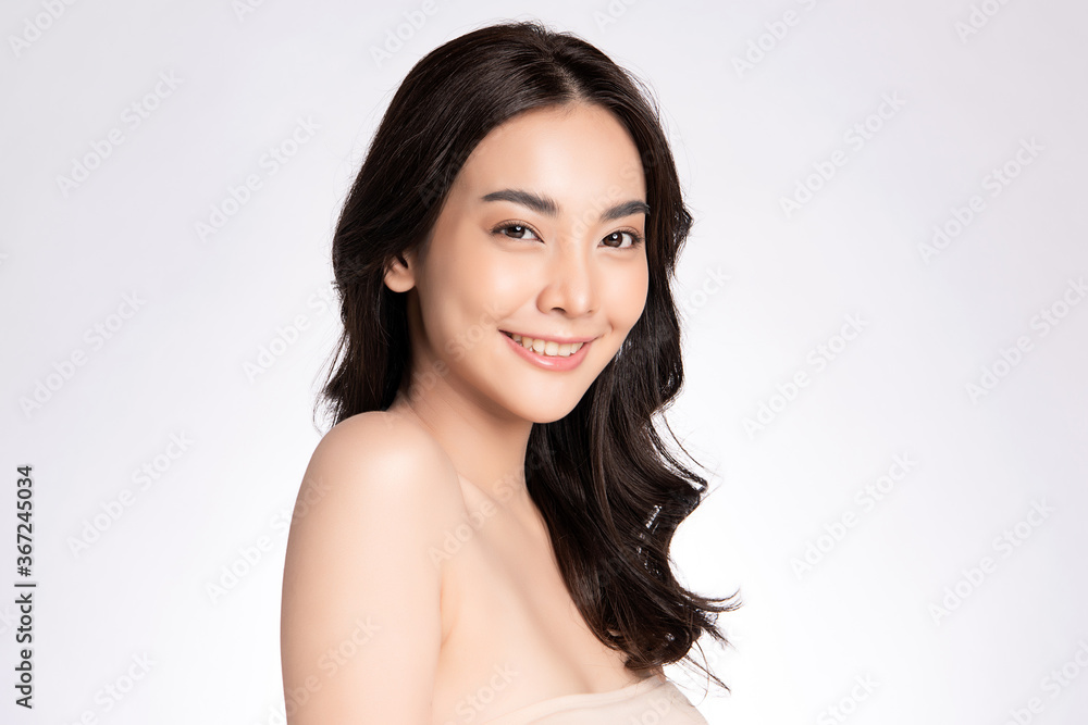 Beautiful Young asian Woman with Clean Fresh Skin, on white background, Face care, Facial treatment, Cosmetology, beauty and spa, Asian women portrait Beautiful Young asian Woman with Clean Fresh Skin, on white background, Face care, Facial treatment, Cosmetology, beauty and spa, Asian women portrait