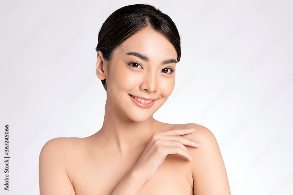 Beautiful Young asian Woman with Clean Fresh Skin, on white background, Face care, Facial treatment, Cosmetology, beauty and spa, Asian women portrait Beautiful Young asian Woman with Clean Fresh Skin, on white background, Face care, Facial treatment, Cosmetology, beauty and spa, Asian women portrait