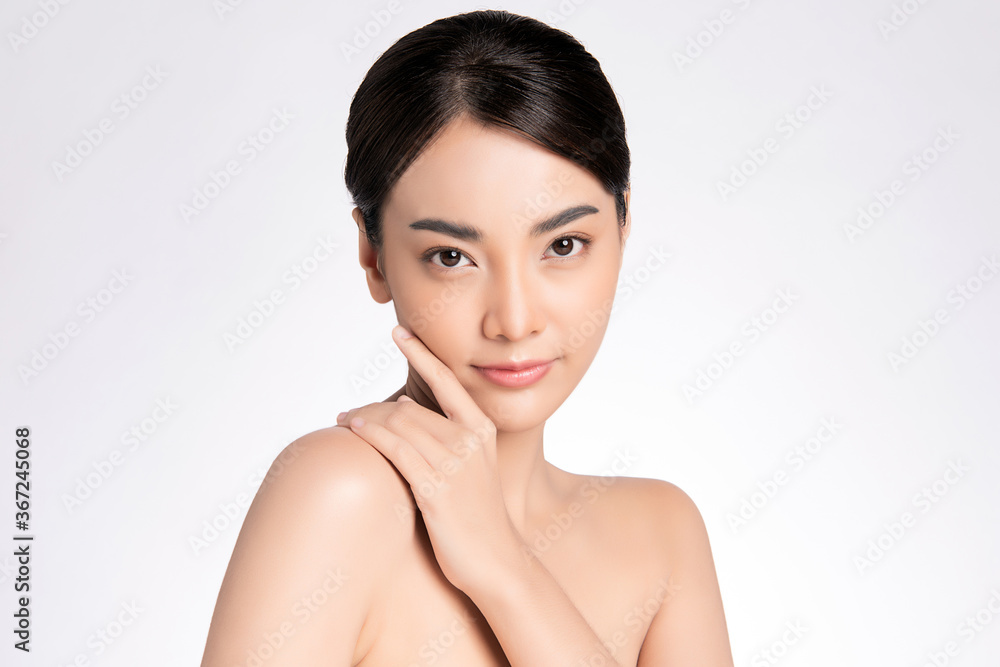 Beautiful Young asian Woman with Clean Fresh Skin, on white background, Face care, Facial treatment, Cosmetology, beauty and spa, Asian women portrait Beautiful Young asian Woman with Clean Fresh Skin, on white background, Face care, Facial treatment, Cosmetology, beauty and spa, Asian women portrait