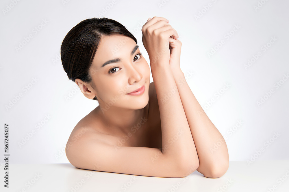Beautiful Young asian Woman with Clean Fresh Skin, on white background, Face care, Facial treatment, Cosmetology, beauty and spa, Asian women portrait Beautiful Young asian Woman with Clean Fresh Skin, on white background, Face care, Facial treatment, Cosmetology, beauty and spa, Asian women portrait