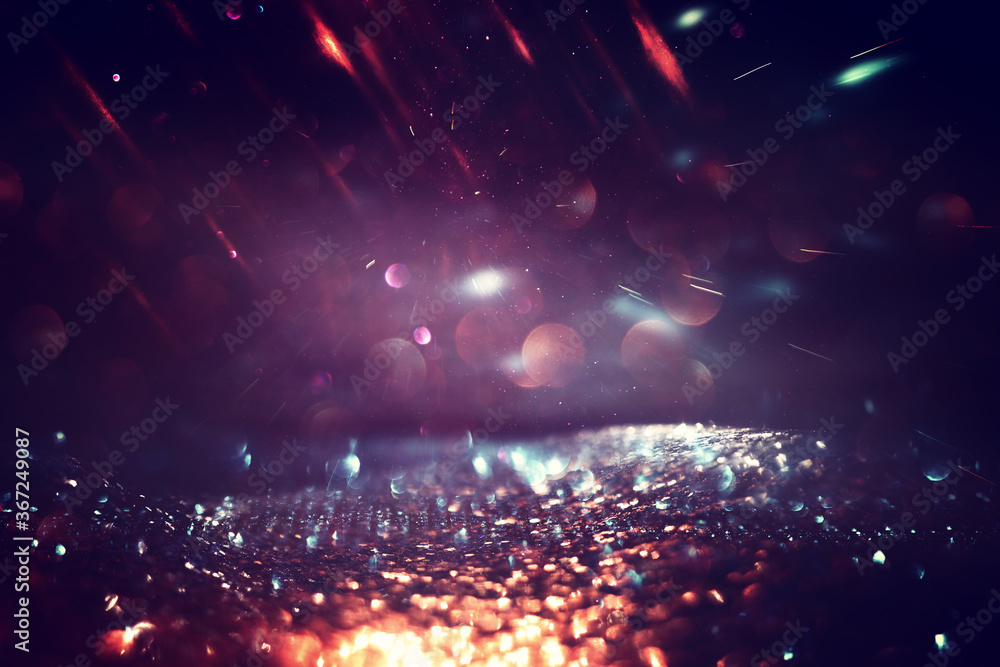Fototapeta premium background of abstract glitter lights. gold and purple. de focused