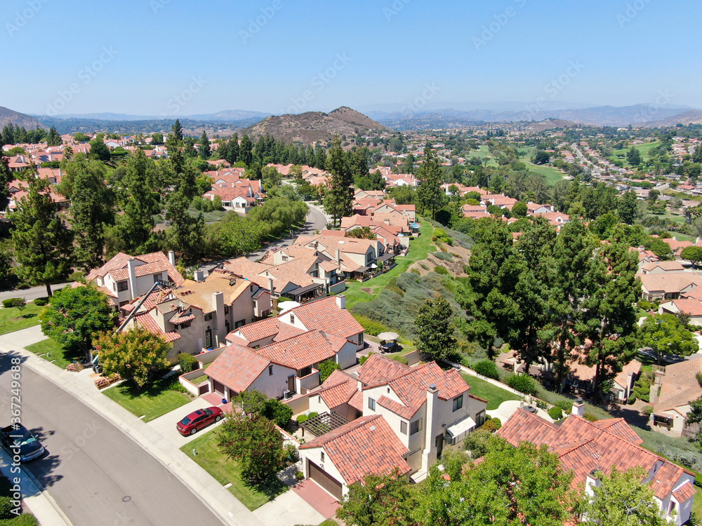 Fototapeta premium Aerial view of residential neighborhood in green valley, Rancho Bernardo, San Diego County, California. USA. 