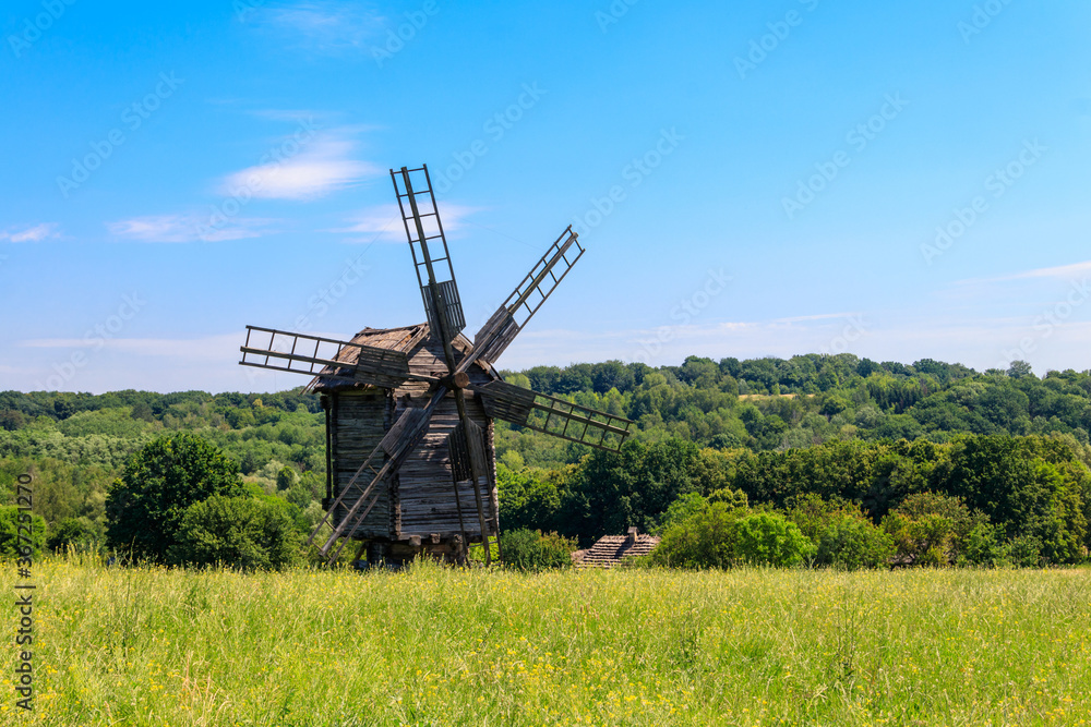 Old wooden windmill in Pyrohiv (Pirogovo) village near Kiev, Ukraine