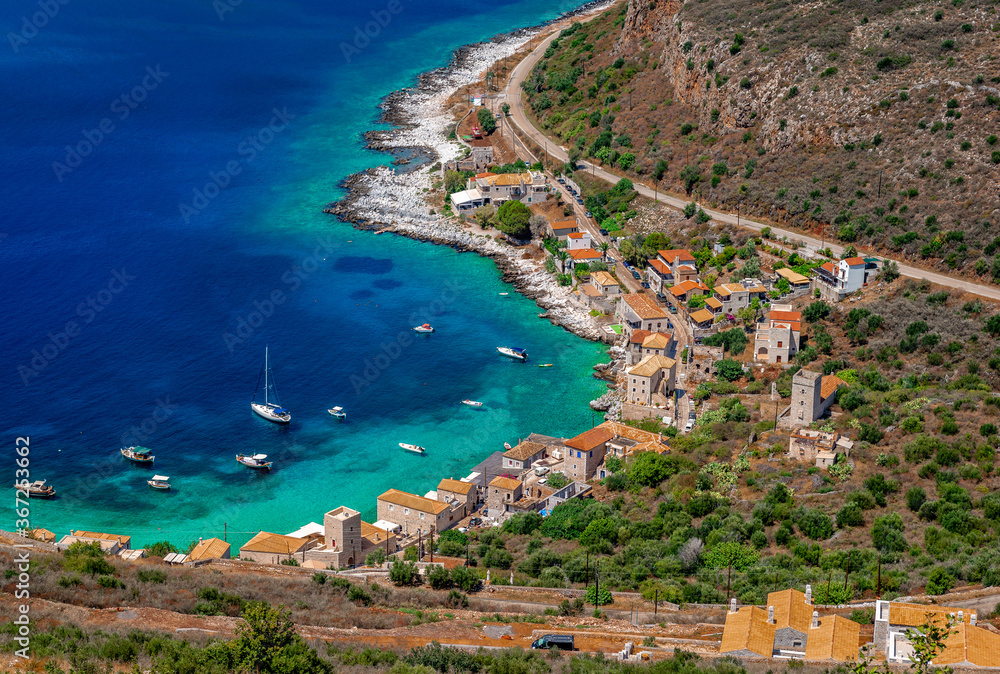 View of Limeni from above. It is a village in Laconian Mani, Greece. It lies on a quite, picturesque beach that attracts many tourists during summertime.