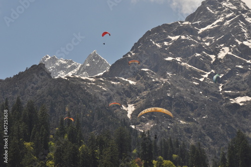 paragliding flying in the sky