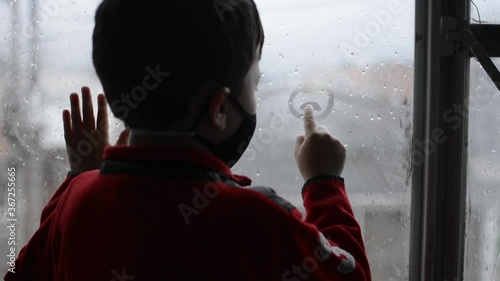 young man in the window