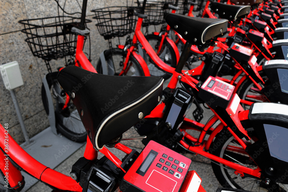 Red bicycles for bike sharing that can be used in each of Japan's major tourist destinations Red bicycles for bike sharing that can be used in each of Japan's major tourist destinations