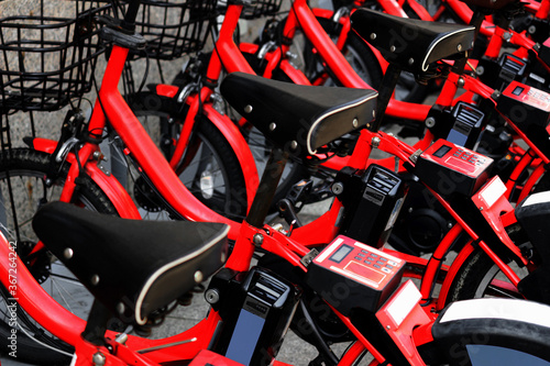 Red bicycles for bike sharing that can be used in major cities in Japan