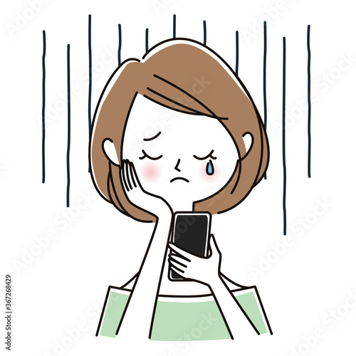 ネットトラブルで悲しむ女性