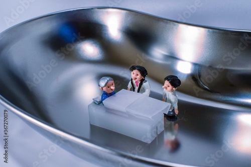 Hospitalized in a pus tray. Patient, doctor and nurse.
Landscape photo of miniature figurine.
All miniature dolls are made by me.
Putty-doll 'miniature studio', Saitama, Japan - JULY 2020