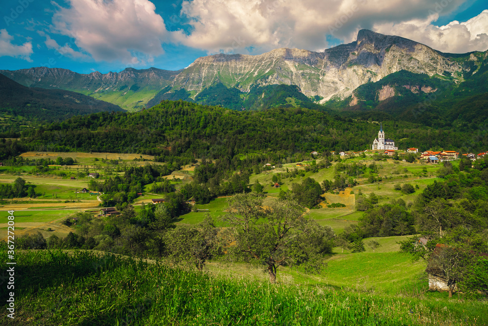 Breathtaking alpine landscape and Dreznica village with mountains, Slovenia