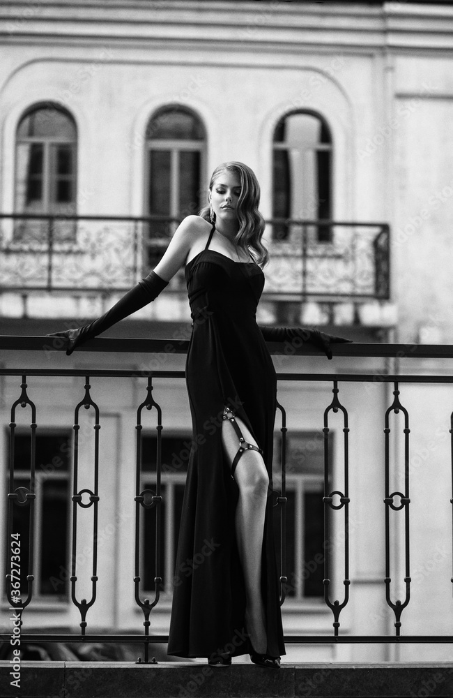 Sexy girl in classic evening dress. Black and white photo film. Luxury ...