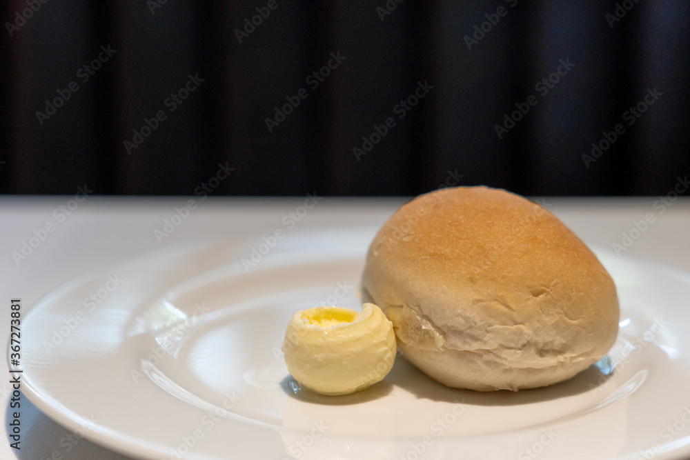 Bread and Butter on white table. Bread and Butter on white table.