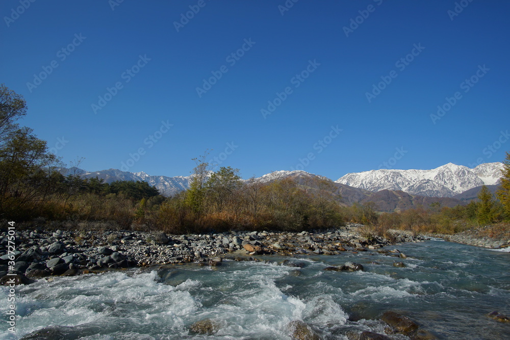 typical mountain landscape of Japanese alps in Hakuba at early Autumn typical mountain landscape of Japanese alps in Hakuba at early Autumn