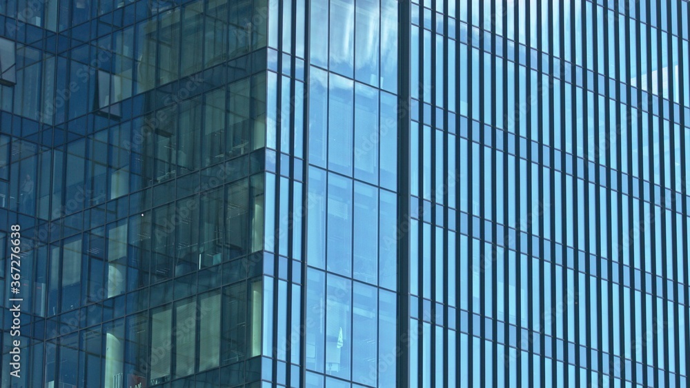Shiny skyscraper with moving clouds reflection. Timelapse for background. Shiny skyscraper with moving clouds reflection. Timelapse for background.