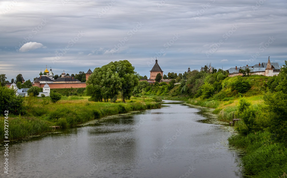 A panoramic view of the monasteries of the city of Suzdal - male and female monastery. Suzdal. Vladimir region. Russia.