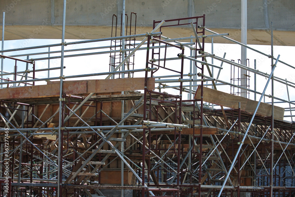 JOHOR, MALAYSIA -APRIL 13, 2016: Scaffolding used as the temporary structure to support platform, form work and structure at the construction site. Also used it as a walking platform for workers.
JOHOR, MALAYSIA -APRIL 13, 2016: Scaffolding used as the temporary structure to support platform, form work and structure at the construction site. Also used it as a walking platform for workers.