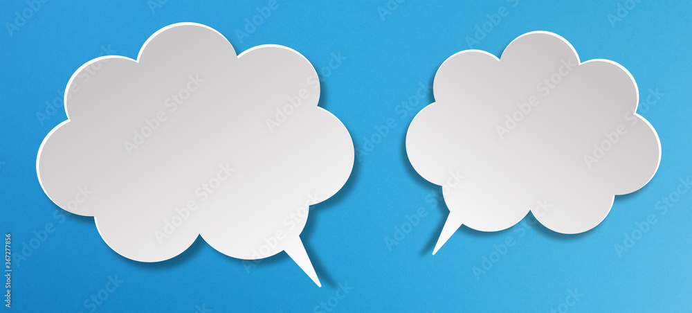 Blank white speech bubbles on blue background Blank white speech bubbles on blue background