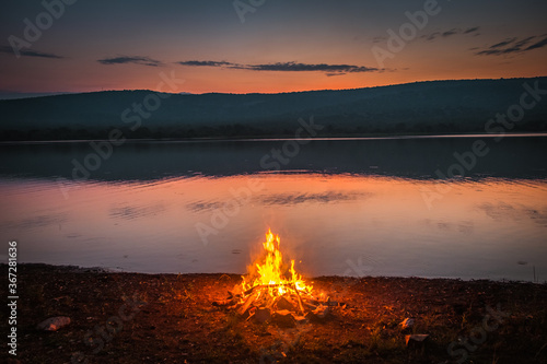 Campfire by the Shakani lake in Akagera National Park, Rwanda