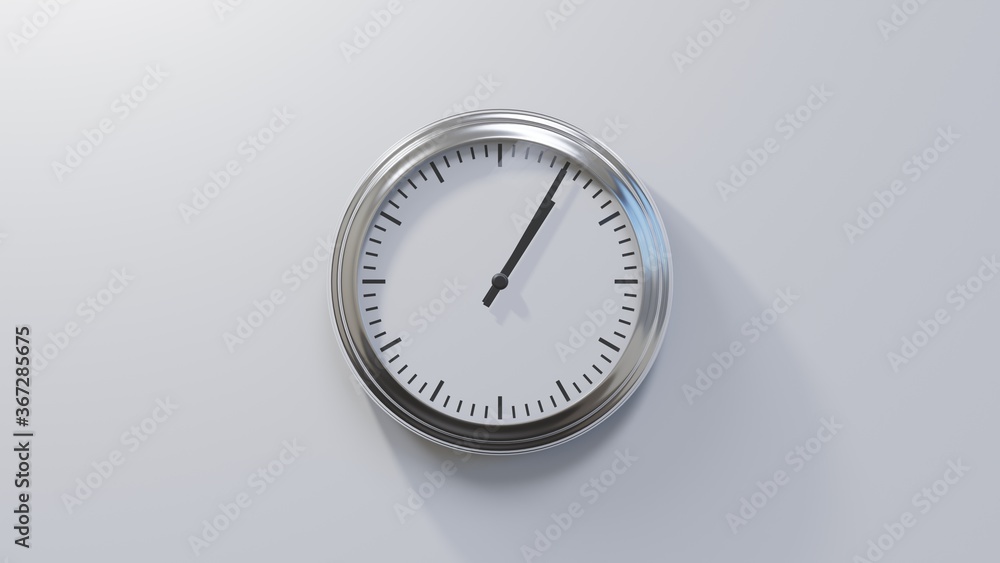Glossy chrome clock on a white wall at five past one. Time is 01:05 or 13:05 Glossy chrome clock on a white wall at five past one. Time is 01:05 or 13:05