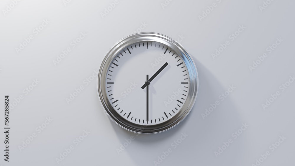 Glossy chrome clock on a white wall at half past one. Time is 01:30 or 13:30 Glossy chrome clock on a white wall at half past one. Time is 01:30 or 13:30